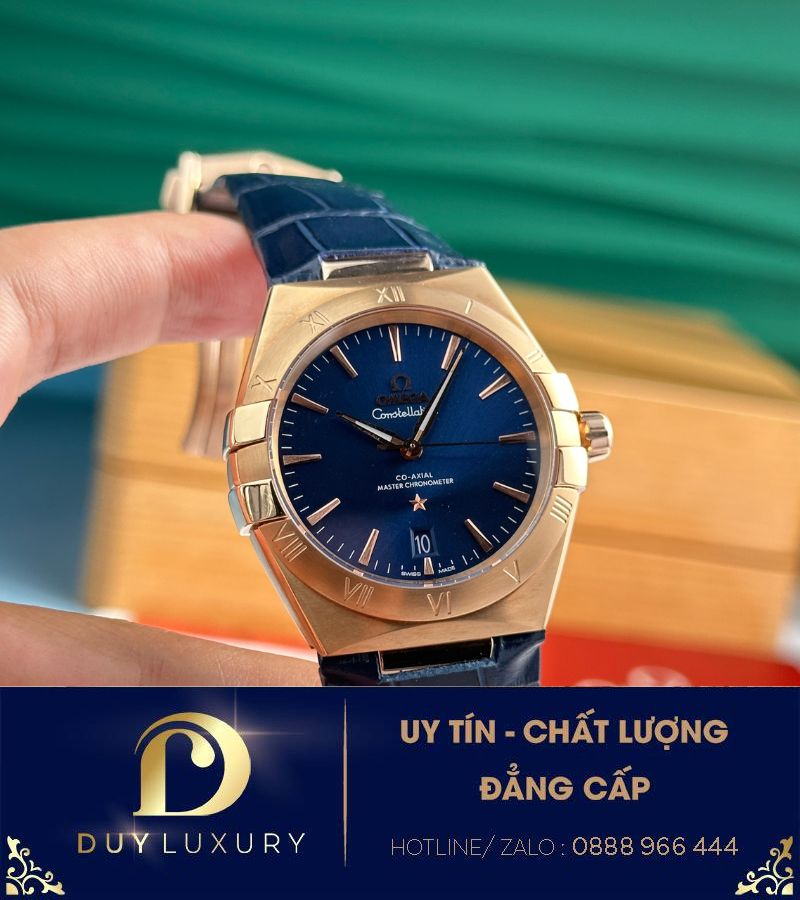 Đồng hồ Omega Constellation vàng hồng mặt xanh blue